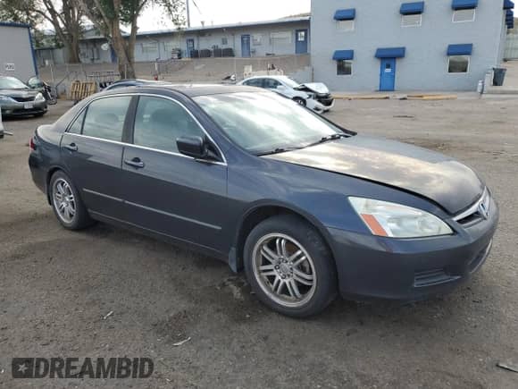 2006 Honda Accord EX-L with VIN 1HGCM65556A004509, listed as a Copart auction lot 60294005 with 147,567 mi miles and Salvage title. Bid and sale history available at DreamBid. Image 4.