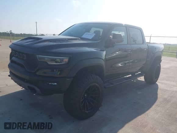 2022 Ram 1500 TRX with VIN 1C6SRFU9XNN249207, listed as a IAAI auction lot 42383861 with 27,211 mi miles and . Bid and sale history available at DreamBid. Image 17.