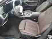 2024 BMW i4 xDrive40 with VIN WBY83FB02RFS58197, listed as a Copart auction lot 66387775 with 9,539 mi miles and Salvage title. Bid and sale history available at DreamBid. Image 7.