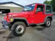 2000 Jeep Wrangler SE with VIN 1J4FA29P8YP711686, listed as a Copart auction lot 68999455 with 100,108 mi miles and Salvage title. Bid and sale history available at DreamBid. Image 1.