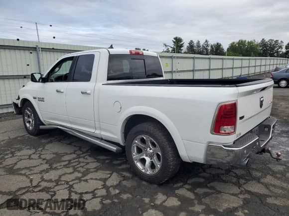 2014 Ram 1500 Laramie с VIN 1C6RR7JT4ES390876, выставлен на аукционе Copart как лот 80023095 с пробегом 173 702 миль миль и Списание • Salvage title. История ставок и продаж доступна на DreamBid. Изображение 2.