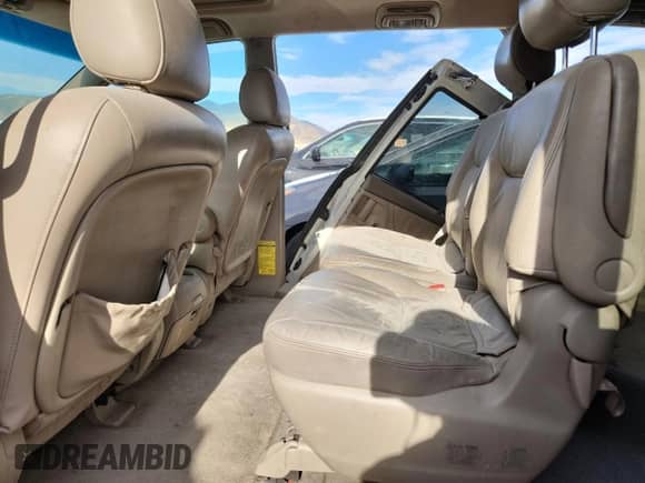 2004 Toyota Sienna XLE z VIN 5TDBA22CX4S001118, wystawiony jako Copart lot #65920175 z przebiegiem 251 232 mil mil oraz Szkoda całkowita • Salvage title. Historia ofert i sprzedaży dostępna na DreamBid. Obrazek 11.