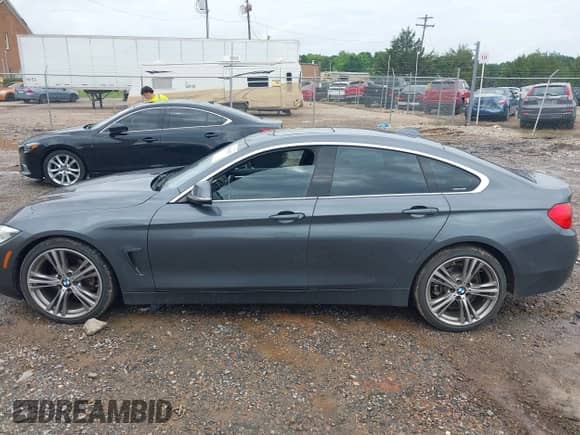 2017 BMW 4 Series 430i with VIN WBA4F7C5XHG785983, listed as a IAAI auction lot 42486625 with 223,245 mi miles and . Bid and sale history available at DreamBid. Image 14.
