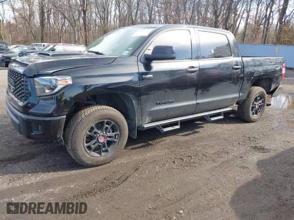2021 Toyota Tundra SR5 with VIN 5TFDY5F10MX964425, listed as a IAAI auction lot 41843735 with 108,005 mi miles and . Bid and sale history available at DreamBid. Image 18.