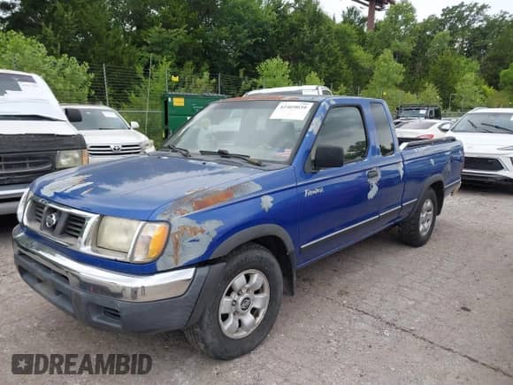 1999 Nissan Frontier XE with VIN 1N6DD26S5XC319085, listed as a IAAI auction lot 42469039 with 59,251 mi miles and . Bid and sale history available at DreamBid. Image 6.