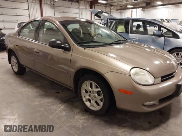 2000 Dodge Neon Highline z VIN 1B3ES46C9YD773497, wystawiony jako IAAI lot #41890890 z przebiegiem 106 889 mil mil oraz . Historia ofert i sprzedaży dostępna na DreamBid. Obrazek 1.