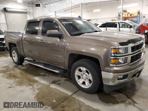 2015 Chevrolet Silverado 1500 LT with VIN 3GCUKREC9FG169652, listed as a Copart auction lot 62856775 with 199,826 mi miles and Salvage title. Bid and sale history available at DreamBid. Image 4.