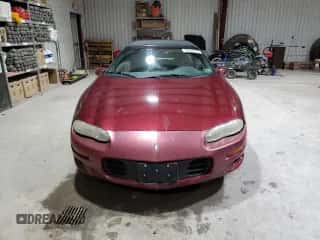 1999 Chevrolet Camaro z VIN 2G1FP32K5X2141301, wystawiony jako Copart lot #82848474 z przebiegiem 207 561 mil mil oraz Szkoda całkowita • Salvage title. Historia ofert i sprzedaży dostępna na DreamBid. Obrazek 5.