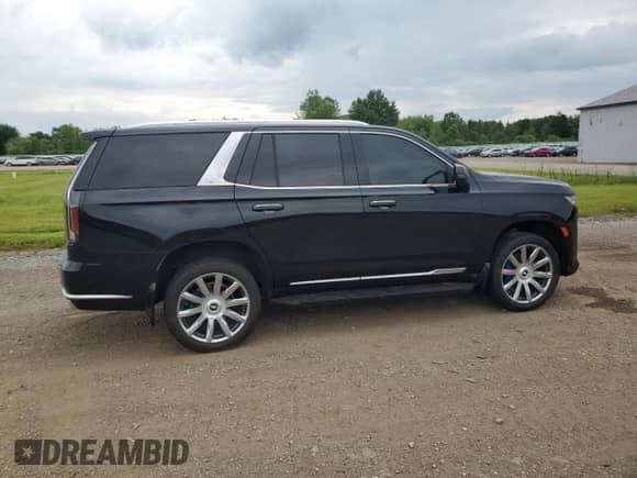 2021 Cadillac Escalade Premium Luxury with VIN 1GYS4BKL4MR474562, listed as a Copart auction lot 62931635 with 59,641 mi miles and Salvage title. Bid and sale history available at DreamBid. Image 3.