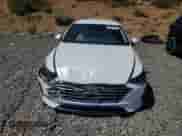 2021 Hyundai Sonata SEL с VIN KMHL34JJ8MA021631, выставлен на аукционе Copart как лот 70217755 с пробегом 31 562 миль миль и Списание • Salvage title. История ставок и продаж доступна на DreamBid. Изображение 5.