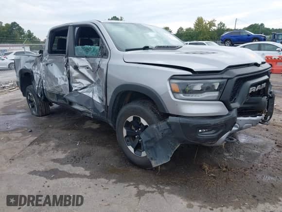 2022 Ram 1500 Rebel z VIN 1C6SRFLT2NN278889, wystawiony jako IAAI lot #43193756 z przebiegiem 88 073 mil mil oraz . Historia ofert i sprzedaży dostępna na DreamBid. Obrazek 6.