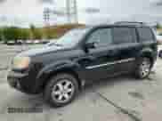 2009 Honda Pilot Touring with VIN 5FNYF48809B052438, listed as a Copart auction lot 69567965 with 286,810 mi miles and Salvage title. Bid and sale history available at DreamBid. Image 1.