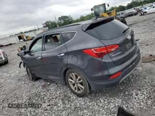 2015 Hyundai Santa Fe с VIN 5XYZU3LA8FG298415, выставлен на аукционе Copart как лот 56180645 с пробегом 181 723 миль миль и Списание • Salvage title. История ставок и продаж доступна на DreamBid. Изображение 2.