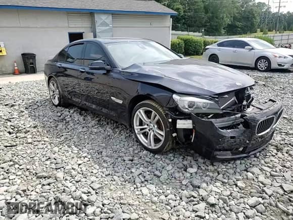 2014 BMW 7 Series 740i с VIN WBAYA6C57ED826660, выставлен на аукционе Copart как лот 59566945 с пробегом 95 828 миль миль и Списание • Salvage title. История ставок и продаж доступна на DreamBid. Изображение 13.