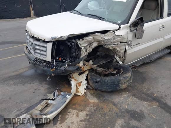 2006 Cadillac Escalade z VIN 1GYEC63N36R114841, wystawiony jako IAAI lot #41544271 z przebiegiem 297 596 mil mil oraz . Historia ofert i sprzedaży dostępna na DreamBid. Obrazek 6.