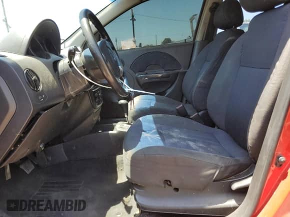 2006 Chevrolet Aveo LS с VIN KL1TD56636B682497, выставлен на аукционе Copart как лот 58052955 с пробегом 236 917 миль миль и Списание • Salvage title. История ставок и продаж доступна на DreamBid. Изображение 7.