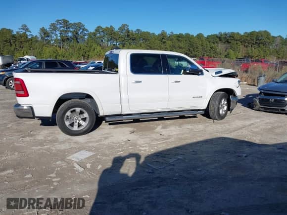 2020 Ram 1500 Laramie with VIN 1C6SRFRT3LN231617, listed as a IAAI auction lot 41280899 with 38,843 mi miles and . Bid and sale history available at DreamBid. Image 13.