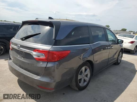 2019 Honda Odyssey EX с VIN 5FNRL6H57KB032336, выставлен на аукционе Copart как лот 71451995 с пробегом 87 475 миль миль и Списание • Salvage title. История ставок и продаж доступна на DreamBid. Изображение 3.