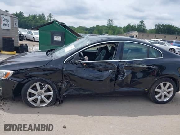 2016 Volvo S60 T5 Drive-E Premier z VIN YV126MFKXG2390847, wystawiony jako IAAI lot #42647884 z przebiegiem 115 397 mil mil oraz . Historia ofert i sprzedaży dostępna na DreamBid. Obrazek 6.