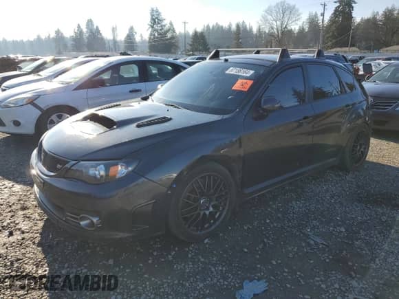 2009 Subaru WRX STI with VIN JF1GR896X9L802972, listed as a Copart auction lot 87186164 with 160,838 mi miles and Salvage title. Bid and sale history available at DreamBid. Image 1.