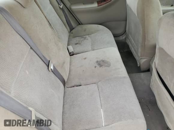 2005 Toyota Corolla LE z VIN 1NXBR32E05Z377819, wystawiony jako Copart lot #85673395 z przebiegiem 299 999 mil mil oraz Szkoda całkowita • Salvage title. Historia ofert i sprzedaży dostępna na DreamBid. Obrazek 10.