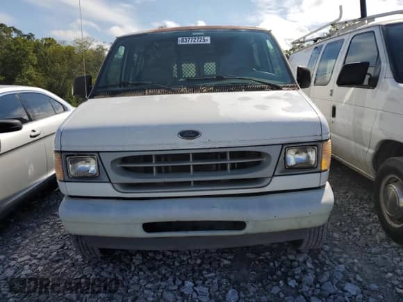 2000 Ford Econoline Cargo z VIN 1FTNE24L1YHB02766, wystawiony jako Copart lot #83772725 z przebiegiem 119 156 mil mil oraz Czysty tytuł • Clean title. Historia ofert i sprzedaży dostępna na DreamBid. Obrazek 5.