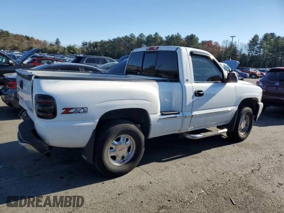2002 GMC Sierra 1500 SLE с VIN 1GTEK14T82Z207695, выставлен на аукционе Copart как лот 79617914 с пробегом Не указан миль и Списание • Salvage title. История ставок и продаж доступна на DreamBid. Изображение 3.