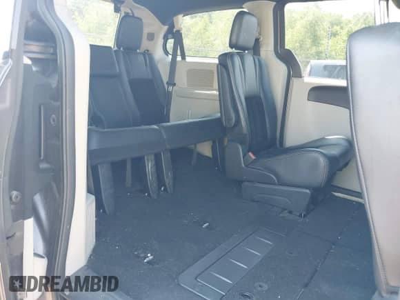 2014 Dodge Grand Caravan SXT with VIN 2C4RDGCG1ER366222, listed as a IAAI auction lot 42454269 with 133,796 mi miles and . Bid and sale history available at DreamBid. Image 8.
