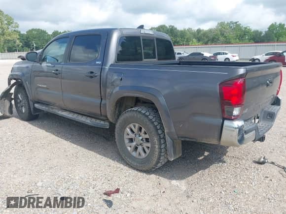 2017 Toyota Tacoma SR5 with VIN 5TFAZ5CN9HX050378, listed as a IAAI auction lot 42245477 with 158,431 mi miles and . Bid and sale history available at DreamBid. Image 3.