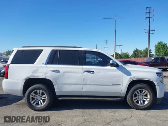 2020 Chevrolet Tahoe LT with VIN 1GNSCBKC0LR195687, listed as a IAAI auction lot 42620344 with 48,059 mi miles and . Bid and sale history available at DreamBid. Image 14.