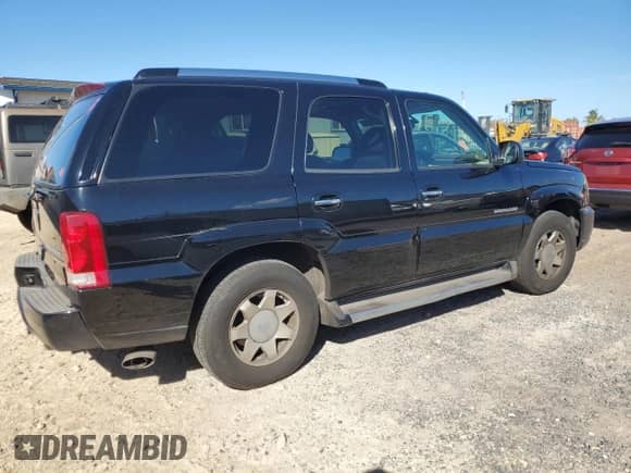 2004 Cadillac Escalade with VIN 1GYEC63T14R117880, listed as a Copart auction lot 63821425 with 284,645 mi miles and Clean title. Bid and sale history available at DreamBid. Image 3.