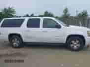 2010 Chevrolet Suburban LT z VIN 1GNUCJE01AR199247, wystawiony jako IAAI lot #42365497 z przebiegiem 289 944 mil mil oraz . Historia ofert i sprzedaży dostępna na DreamBid. Obrazek 13.