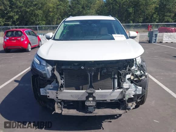 2022 Nissan Pathfinder SL with VIN 5N1DR3CC1NC269012, listed as a IAAI auction lot 43356202 with 64,982 mi miles and . Bid and sale history available at DreamBid. Image 13.