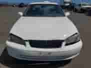 2001 Toyota Camry CE z VIN JT2BG22K910594015, wystawiony jako Copart lot #65016895 z przebiegiem 164 481 mil mil oraz Szkoda całkowita • Salvage title. Historia ofert i sprzedaży dostępna na DreamBid. Obrazek 5.