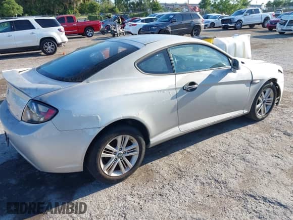 2008 Hyundai Tiburon GS с VIN KMHHM66D98U292591, выставлен на аукционе IAAI как лот 42021445 с пробегом 219 750 миль миль и . История ставок и продаж доступна на DreamBid. Изображение 4.