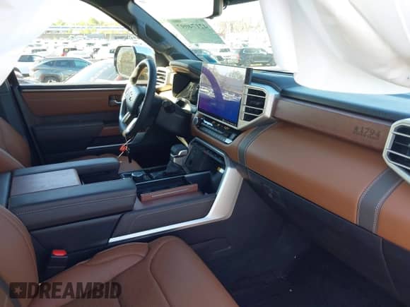 2024 Toyota Tundra 1794 Edition with VIN 5TFMA5DB1RX201000, listed as a IAAI auction lot 42174097 with 7,110 mi miles and . Bid and sale history available at DreamBid. Image 5.