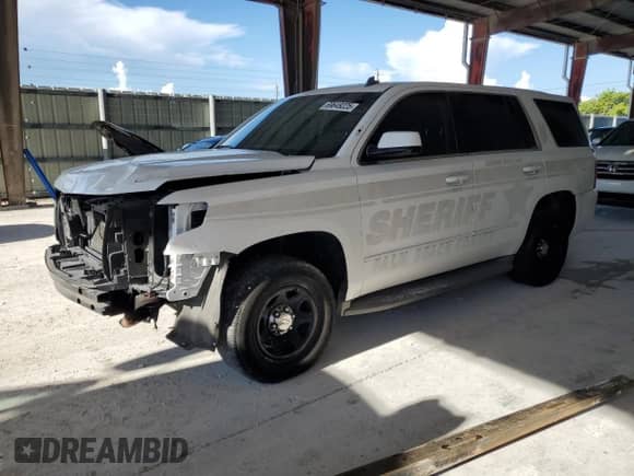 2015 Chevrolet Tahoe Commercial with VIN 1GNLC2EC1FR278100, listed as a Copart auction lot 69649225 with 156,414 mi miles and Clean title. Bid and sale history available at DreamBid. Image 1.