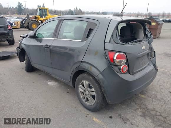 2016 Chevrolet Sonic LT with VIN 1G1JC6SB6G4145245, listed as a IAAI auction lot 41353744 with 103,371 mi miles and . Bid and sale history available at DreamBid. Image 3.