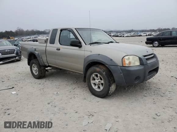 2001 Nissan Frontier SE Desert Runner with VIN 1N6ED26T81C340064, listed as a Copart auction lot 88219545 with 184,623 mi miles and Salvage title. Bid and sale history available at DreamBid. Image 4.