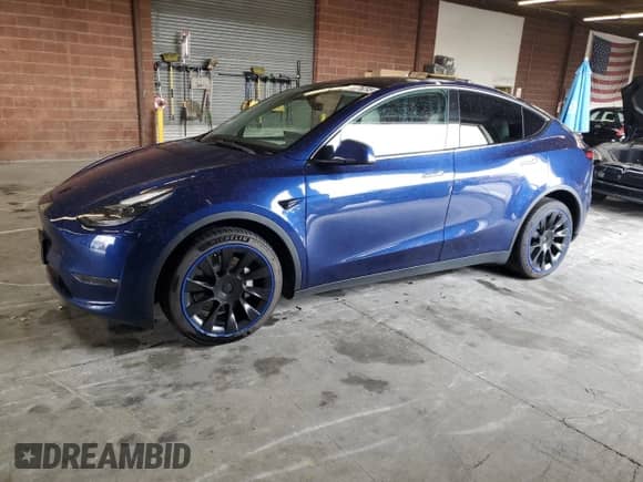 2023 Tesla Model Y Long Range с VIN 7SAYGDEE9PF815046, выставлен на аукционе Copart как лот 86676295 с пробегом 26 191 миль миль и Списание • Salvage title. История ставок и продаж доступна на DreamBid. Изображение 1.