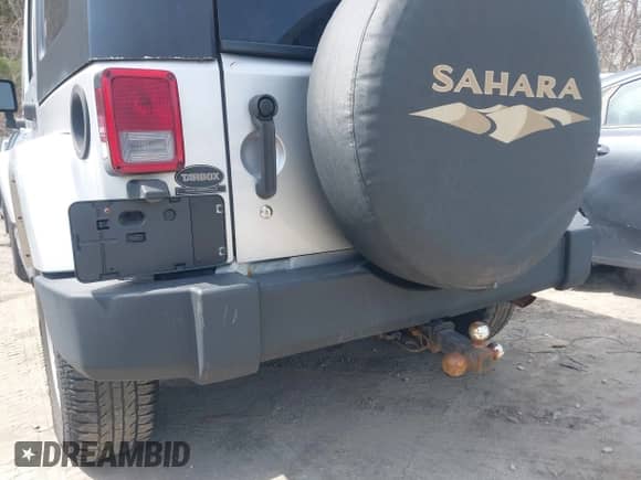 2007 Jeep Wrangler Unlimited Sahara z VIN 1J4GA59167L195254, wystawiony jako IAAI lot #41945934 z przebiegiem 252 496 mil mil oraz . Historia ofert i sprzedaży dostępna na DreamBid. Obrazek 6.