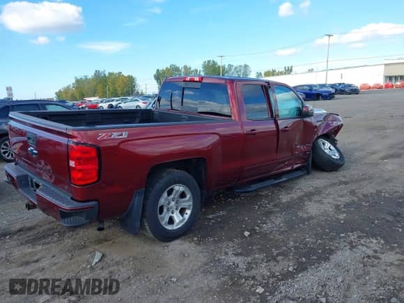 2016 Chevrolet Silverado 1500 LT z VIN 1GCVKREC7GZ162348, wystawiony jako IAAI lot #43447333 z przebiegiem 85 557 mil mil oraz . Historia ofert i sprzedaży dostępna na DreamBid. Obrazek 4.