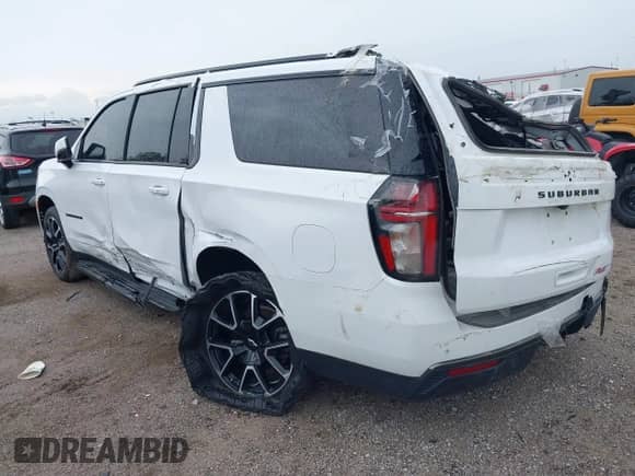 2021 Chevrolet Suburban RST z VIN 1GNSKEKD5MR171223, wystawiony jako IAAI lot #41752843 z przebiegiem 62 509 mil mil oraz . Historia ofert i sprzedaży dostępna na DreamBid. Obrazek 3.