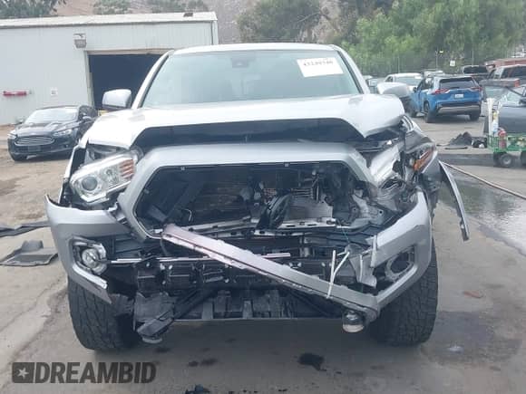 2019 Toyota Tacoma SR5 with VIN 3TMAZ5CN9KM108003, listed as a IAAI auction lot 43249340 with 80,485 mi miles and . Bid and sale history available at DreamBid. Image 13.
