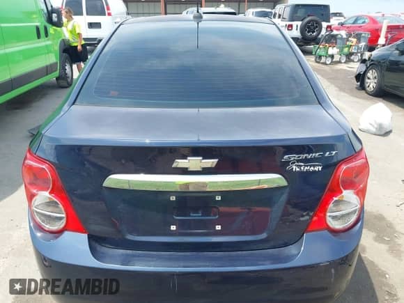 2016 Chevrolet Sonic LT z VIN 1G1JC5SH7G4114939, wystawiony jako IAAI lot #42852071 z przebiegiem 137 268 mil mil oraz . Historia ofert i sprzedaży dostępna na DreamBid. Obrazek 16.