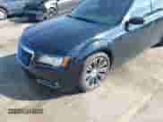 2014 Chrysler 300 S with VIN 2C3CCABT7EH180960, listed as a IAAI auction lot 38901474 with 141,716 mi miles and . Bid and sale history available at DreamBid. Image 6.