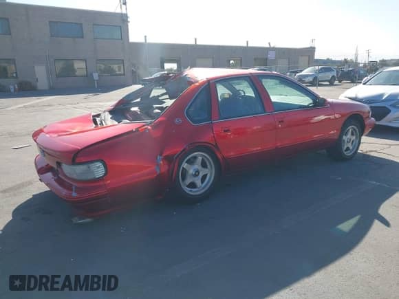 1996 Chevrolet Caprice 1SA Special Value z VIN 1G1BL52P1TR111673, wystawiony jako IAAI lot #42549195 z przebiegiem 107 637 mil mil oraz . Historia ofert i sprzedaży dostępna na DreamBid. Obrazek 4.