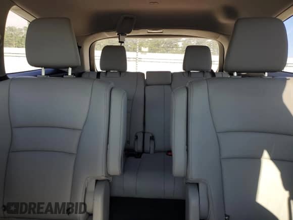 2021 Honda Pilot Touring 7-Passenger z VIN 5FNYF5H60MB024751, wystawiony jako Copart lot #61202525 z przebiegiem 56 737 mil mil oraz Szkoda całkowita • Salvage title. Historia ofert i sprzedaży dostępna na DreamBid. Obrazek 10.