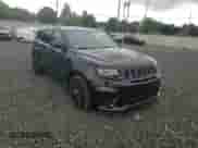 2018 Jeep Grand Cherokee Trackhawk with VIN 1C4RJFN90JC397921, listed as a Copart auction lot 68282005 with 70,720 mi miles and Salvage title. Bid and sale history available at DreamBid. Image 13.