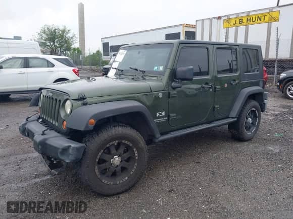 2007 Jeep Wrangler Unlimited X с VIN 1J4GA39127L231378, выставлен на аукционе IAAI как лот 42252475 с пробегом 152 568 миль миль и . История ставок и продаж доступна на DreamBid. Изображение 18.